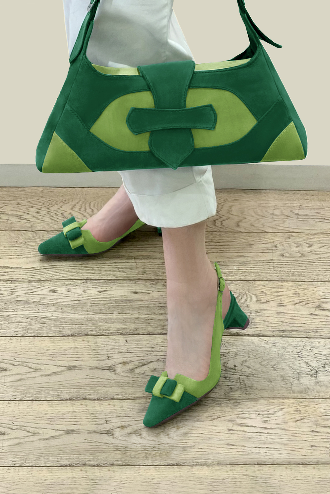 Emerald green women's open back shoes, with a knot. Tapered toe. Medium comma heels. Worn view - Florence KOOIJMAN